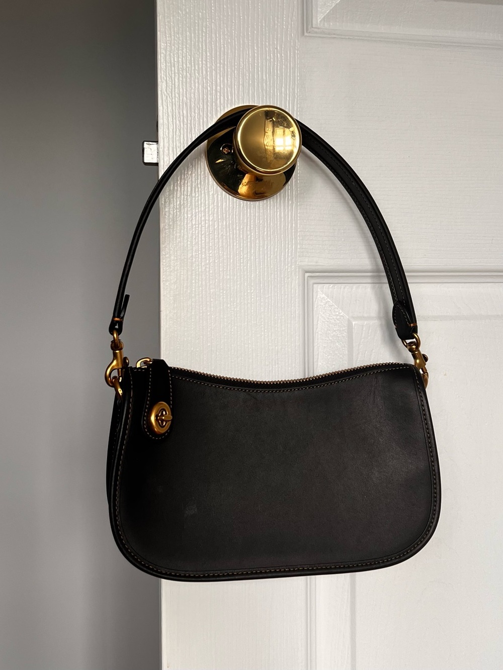 Coach Black Swinger Bag
